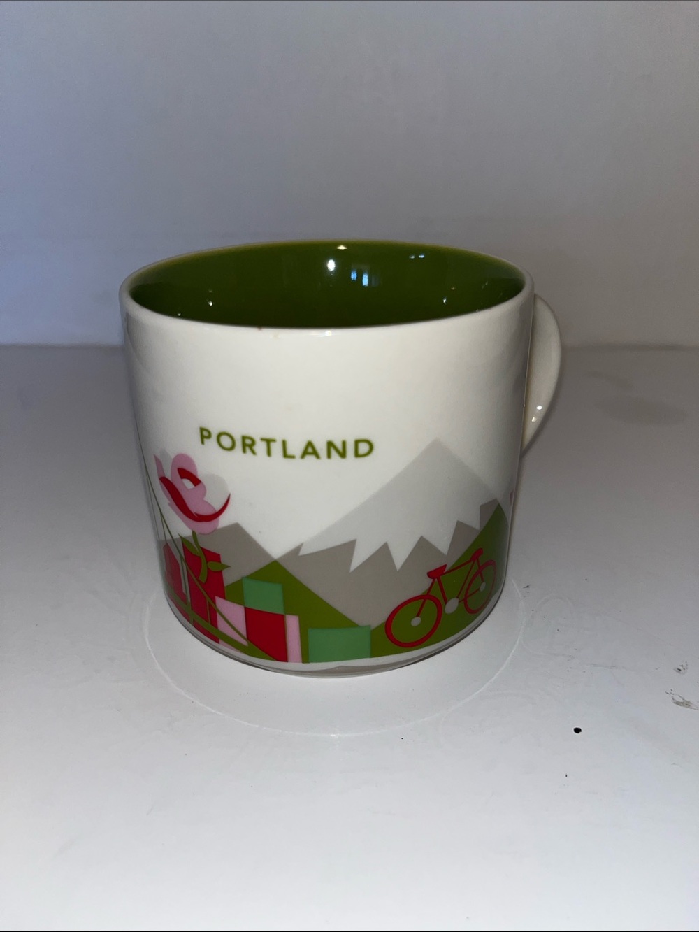 Starbucks Portland Ceramic Mug with Green Interior and Pink Accents